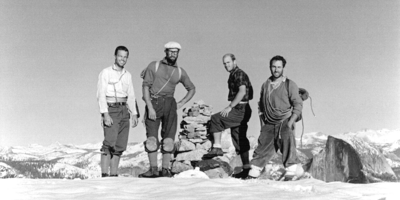 Four men summiting El Capitan mountain