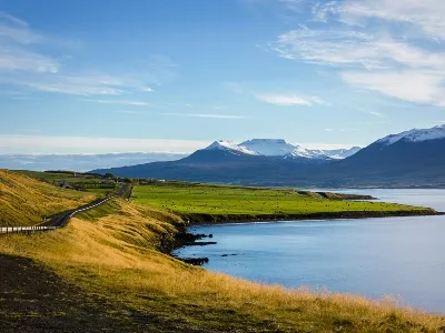 Iceland in Summer with the clear waters and green hills