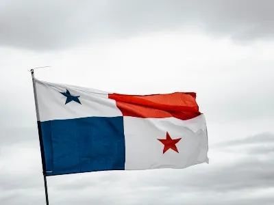 The Panama flag flying on the island