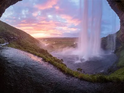 Waterfall caves in Iceland in Summer