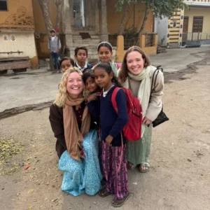 Venetia with the local children during her travels