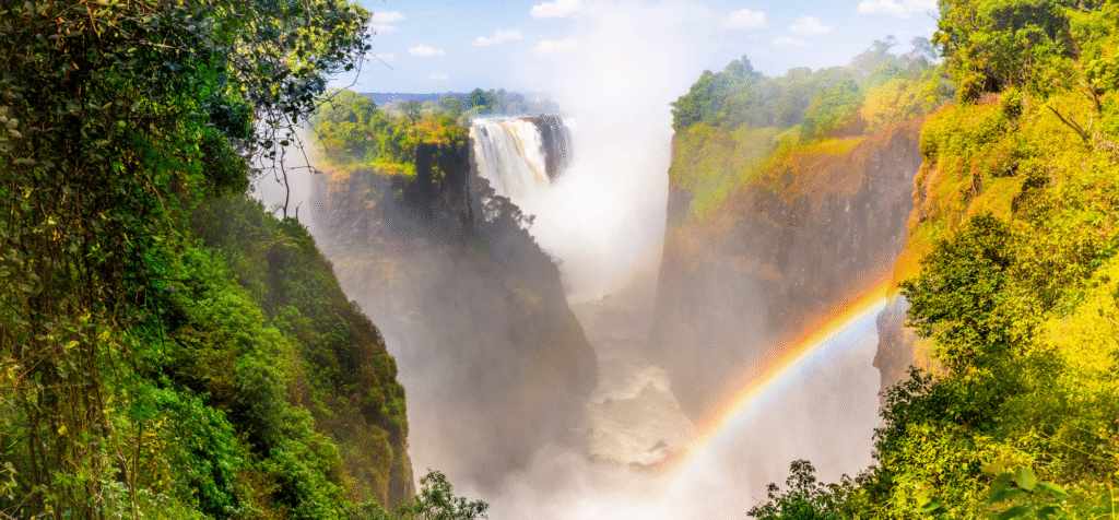 Victoria Falls, one of the best places to visit in Zambia, with double rainbows