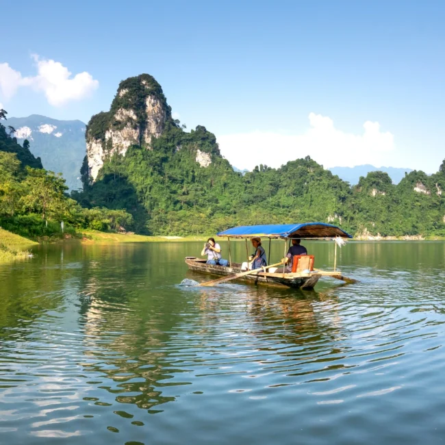 People on a boat on a conservation vacation