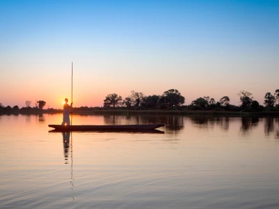 Man on a canoe in the Okovanga Delta
