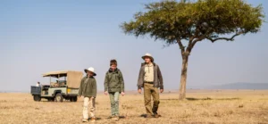 Family walking on a family safari in Africa