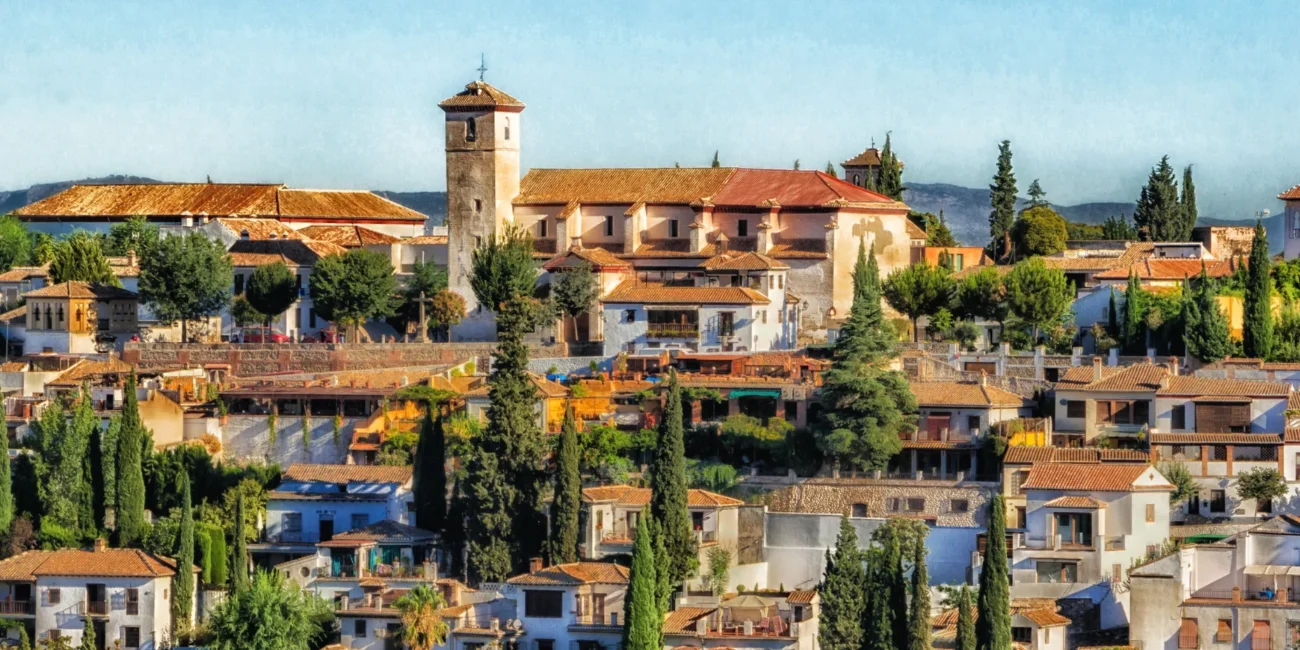 Traditional Spanish houses and trees
