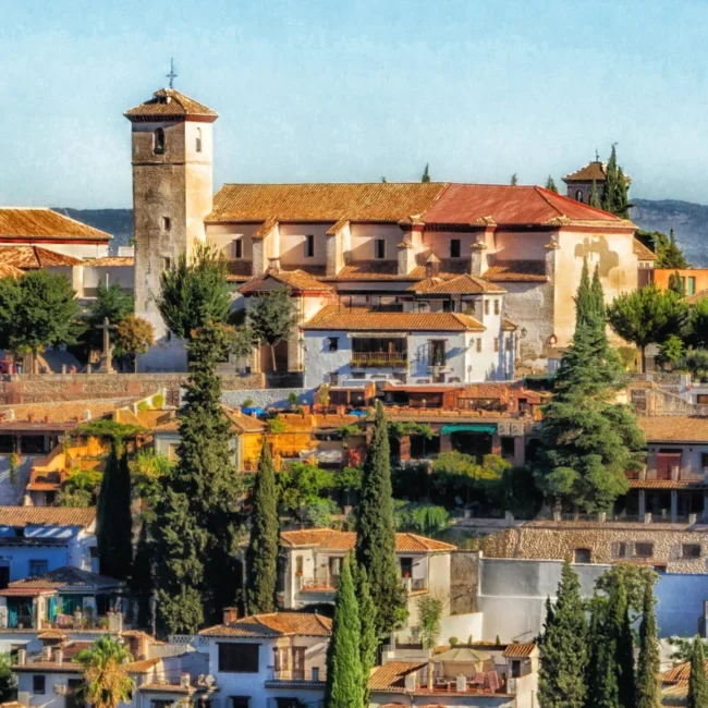 Traditional Spanish houses and trees