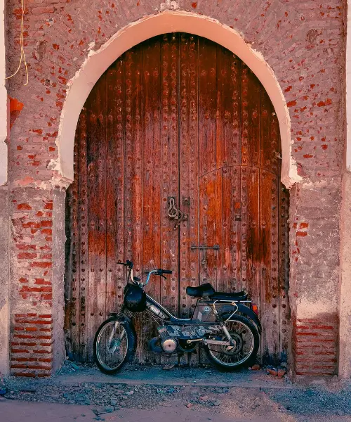 Motorbike in a doorway in Marrakesh