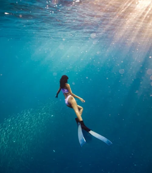 Woman diving in Latin America